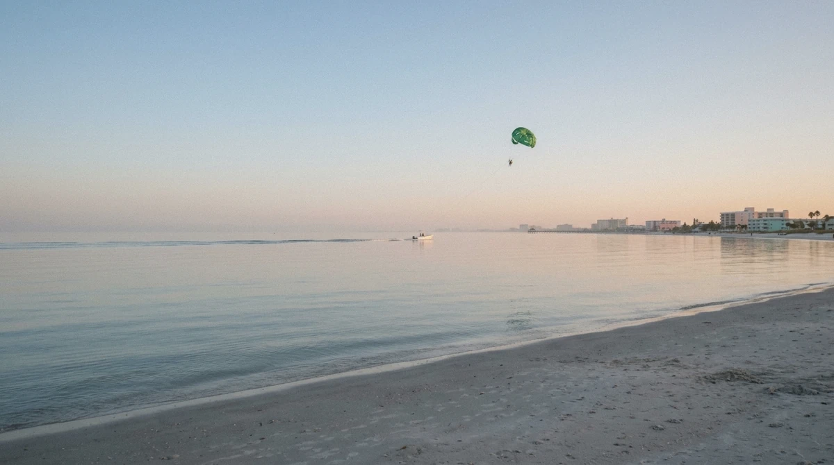 Glassy calm Gulf of Mexico water at sunrise, the best time for parasailing on St. Pete Beach before the afternoon sea breeze picks up